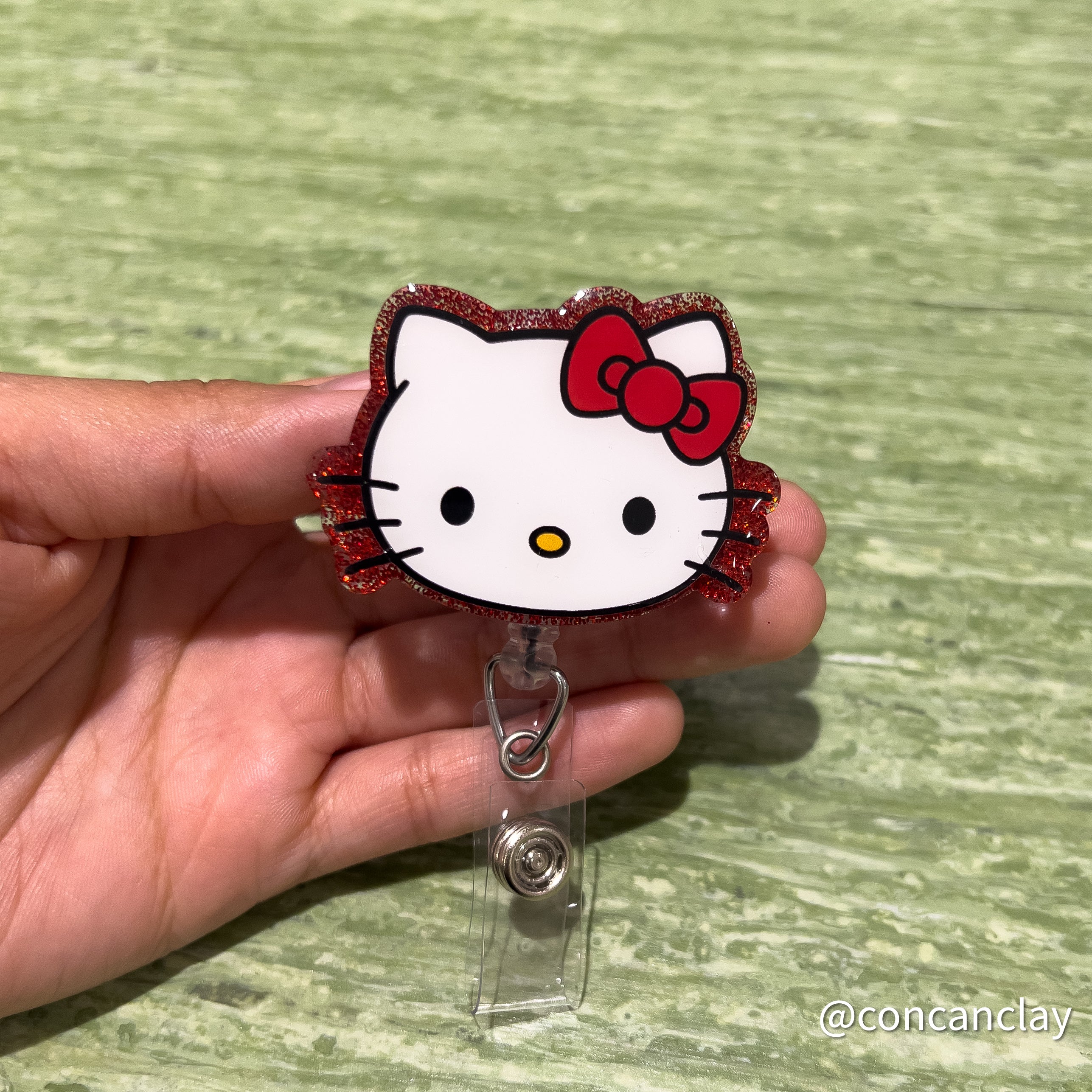 Kitty discount badge reel collection